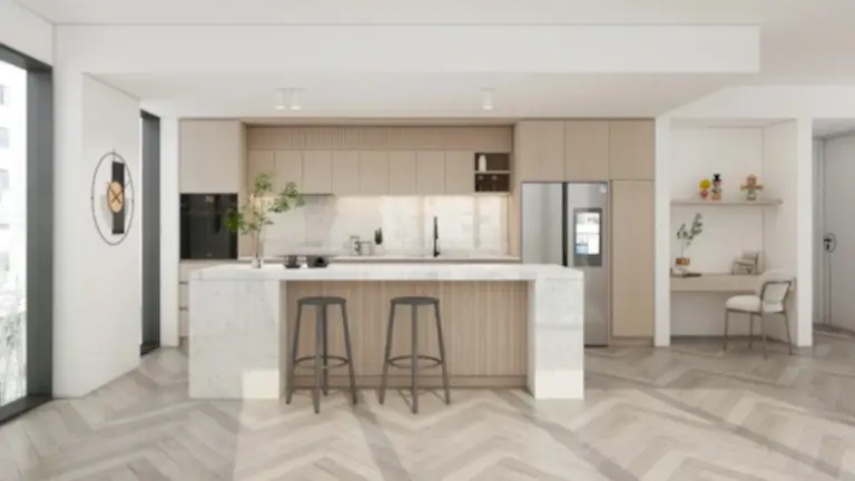 A modern kitchen featuring wood grain kitchen cabinets, crafted from particle board with a melamine finish. The marble island complements the warm wood tones, offering a stylish and functional cooking space.