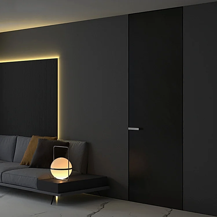 Product 8 Modern black invisible interior door with a seamless flush design, featuring a sleek handle and integrated into a minimalist dark-toned living space.